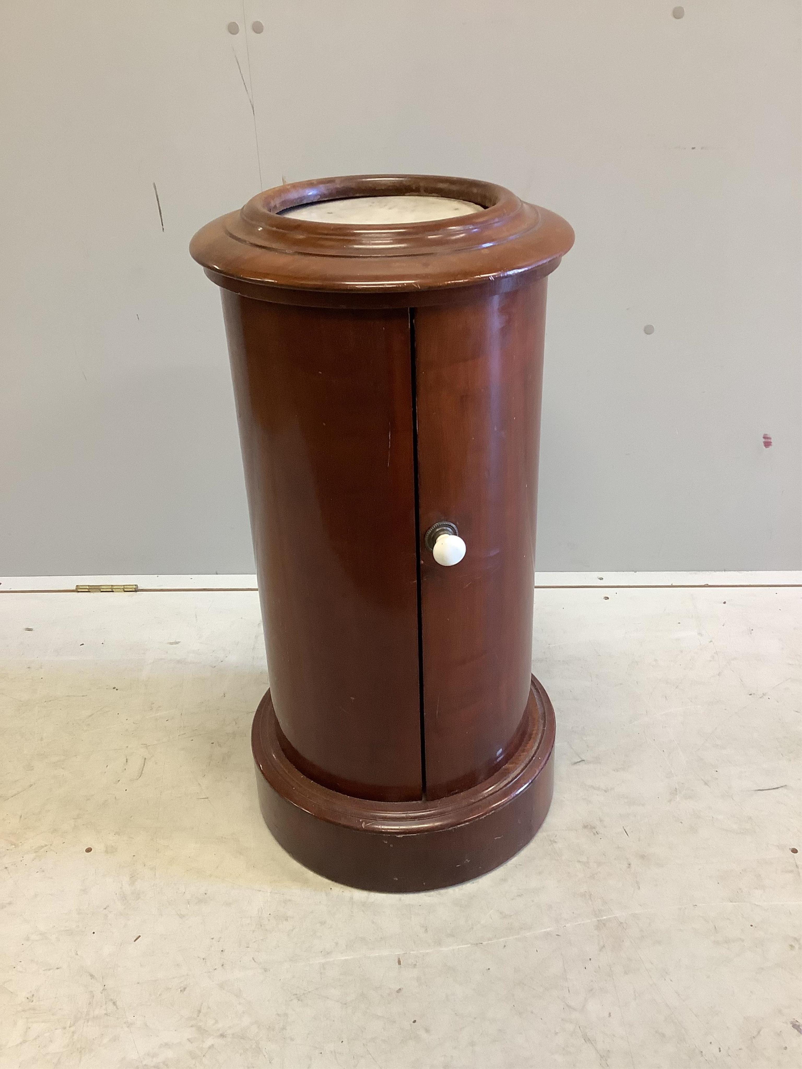 A Victorian mahogany cylindrical marble topped bedside cabinet, diameter 38cm, height 75cm. Condition - fair